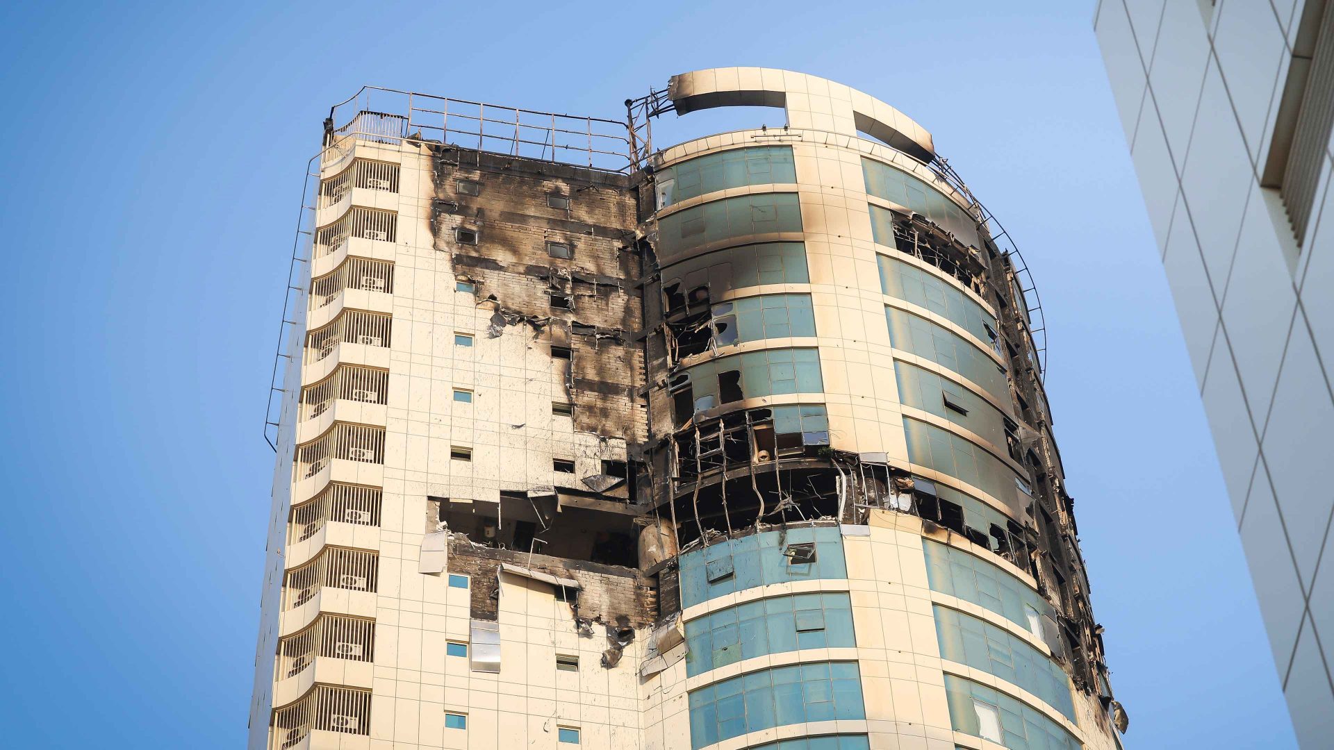 Damage after a kamikaze drone struck several buildings during Iranâs retaliatory attack following US and Israeli strikes in Manama, Bahrain. Photo: Stringer/Anadolu via Getty Images