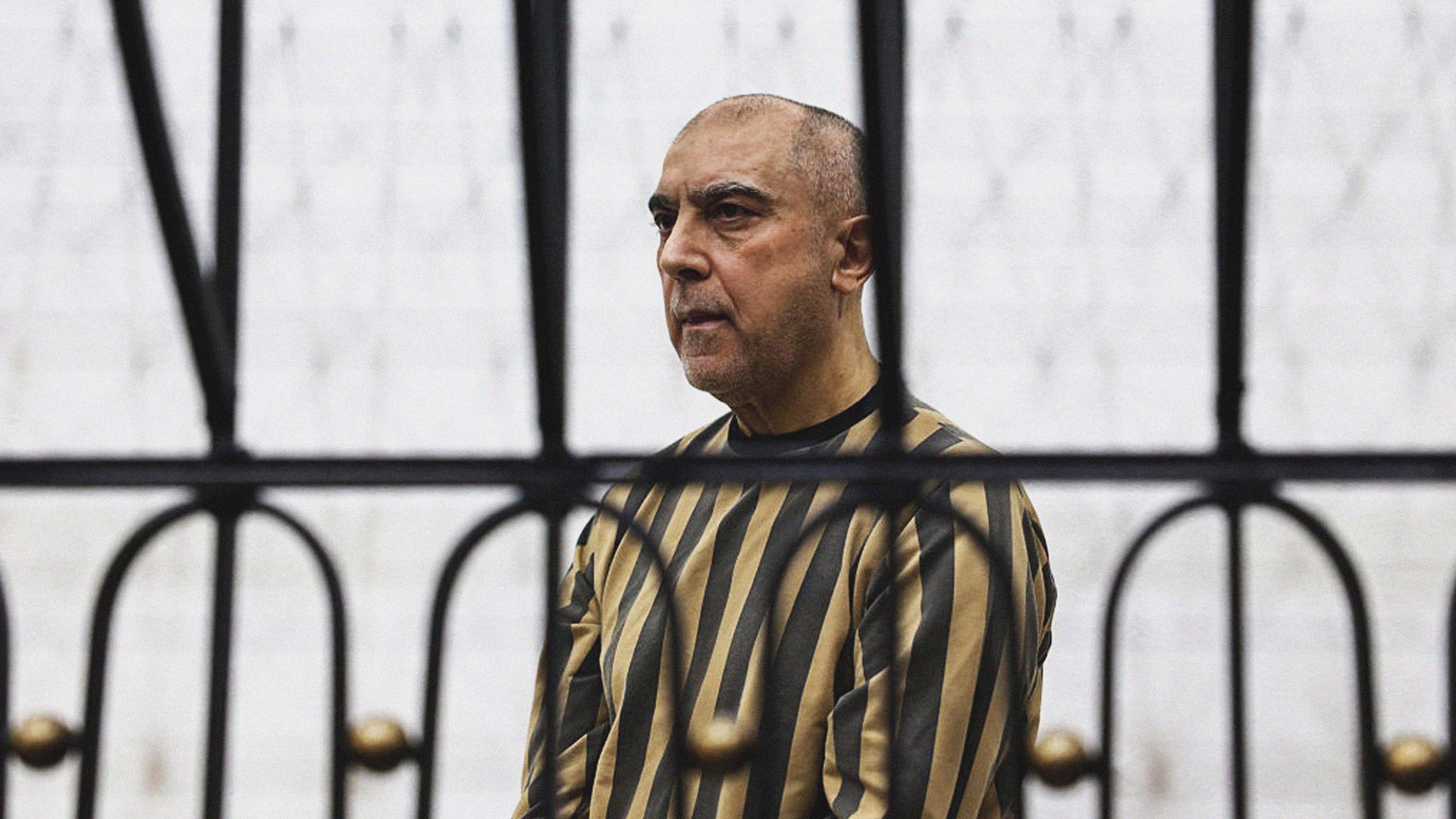Former head of political security in south Syria's Daraa province, Atif Najib attends the first trial session at the Palace of Justice. Photo: Bakr ALkasem / AFP via Getty Images