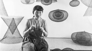 Ruth Asawa making wire sculptures, 1954. Image: Ruth Asawa Lanier Inc