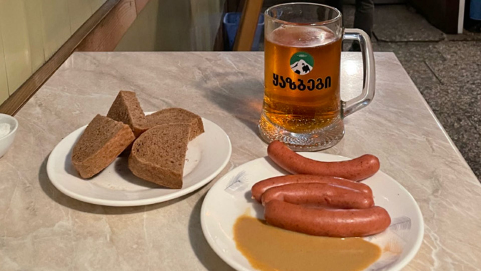 Sausages, beer and bread for £3: The Tbilisi cafe you can’t miss