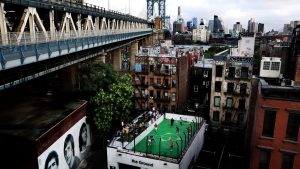 A roof-top football 
pitch in Manhattan. Photo: CARL RECINE