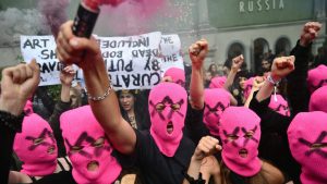 International women's movement FEMEN and Pussy Riot activists stage a protest against the participation of Russia in the Venice Biennale art show, in front of Russian pavilion. Photo: Marco BERTORELLO / AFP via Getty Images