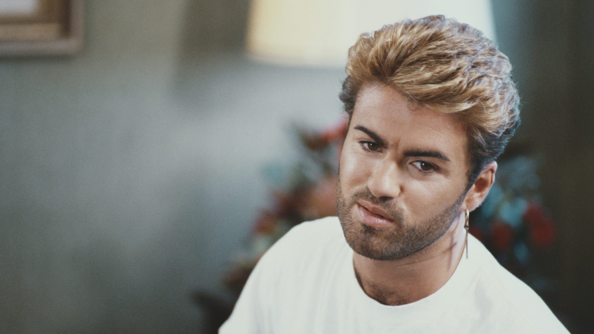 George Michael pictured during the Japanese/Australasian leg of his Faith world tour, 1988. Image: Michael Putland/Getty