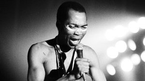 Nigerian musician Fela Kuti performs on stage in Paris, 1981. Image: Michael Putland/Getty