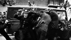 Police attempt to maintain order as riots break out at the 1976 Notting Hill Carnival. Image: Kypros