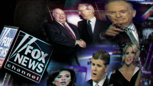 Adverts featuring Fox News presenters, including Tucker Carlson and Sean Hannity, on the News Corporation building in New York City. Image: Drew Angerer/Getty