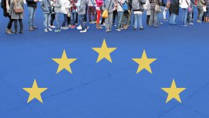 
Rejoining the EU would mean fewer queues, no blue passports and Nigel Farage never shutting up. Image: TNW/Getty
