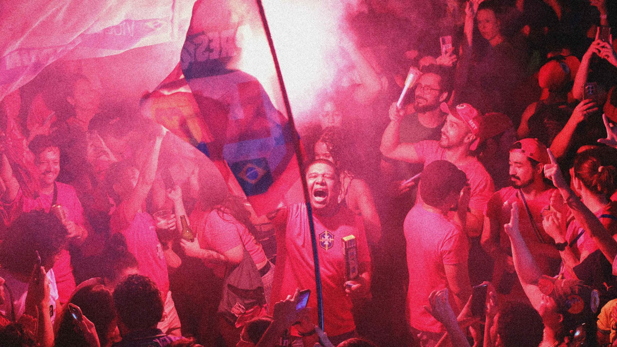 Supporters of Luiz Inacio Lula da Silva celebrate after learning the results of the presidential runoff election in Brazil. Photo: Igo ESTRELA / AFP via Getty Images