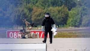 An investigator works in the aftermath of an attempted terror attack at Leipzig/Halle airport last month. Image: Jens Schlueter/Getty