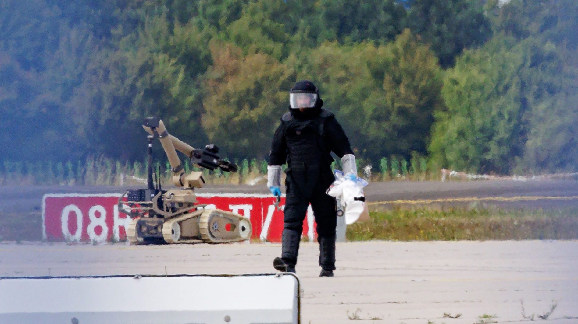 An investigator works in the aftermath of an attempted terror attack at Leipzig/Halle airport last month. Image: Jens Schlueter/Getty