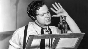 US actor, producer and director Orson Welles during a broadcast of his CBS radio programme First Person Singular, c. 1938. Image: Hulton Archive/Getty